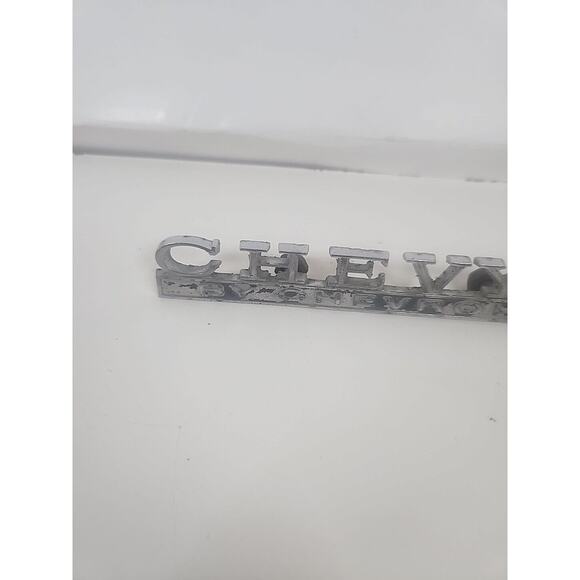 CHEVROLET CHEVY II EMBLEM ORNAMENT " CHEVY II " Part Number 7745749 - Picture 2 of 5